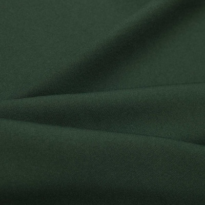 Ткань костюмная 21010 2076, 225 гр/м2, шир.150см, цвет т.зеленый - купить в Махачкале. Цена 390.73 руб.